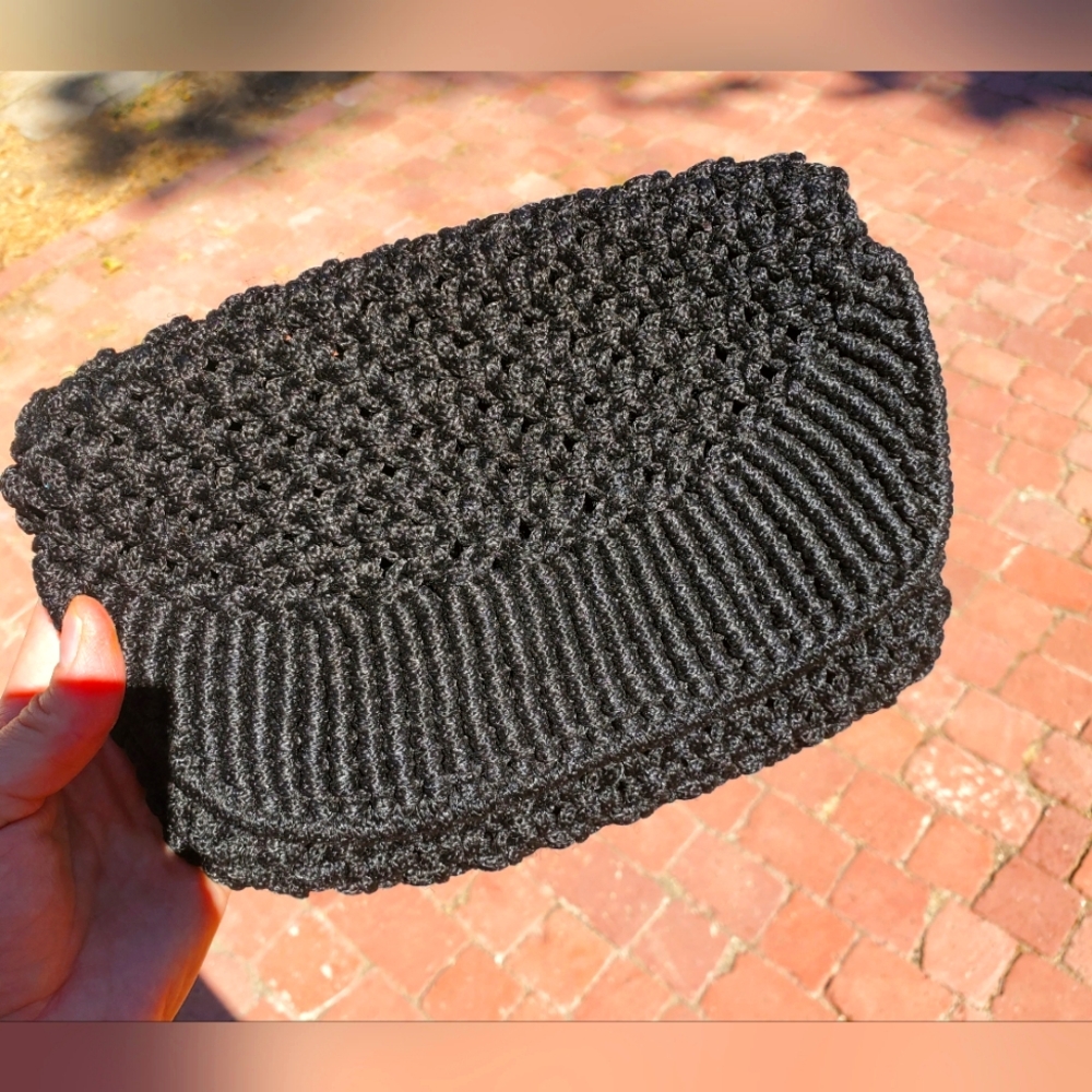 Crocheted black clutch